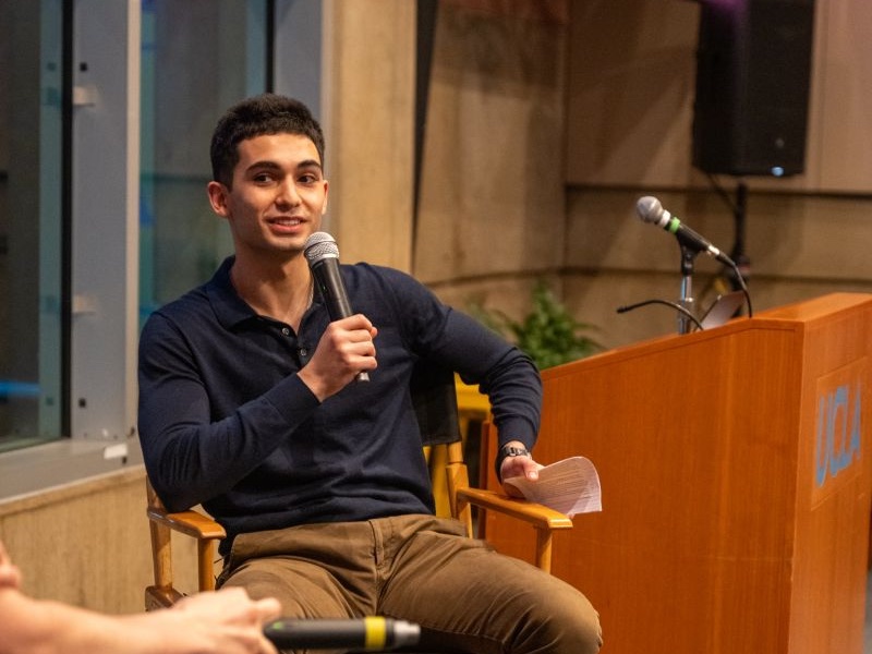 Manvel Muradyan speaking at a fireside chat at UCLA